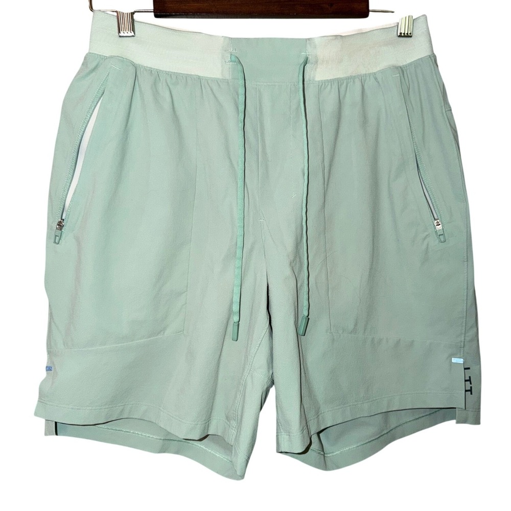 Lululemon License to Train LTT L98 Mens Shorts Size S 7" Inseam Zip Pocket Green